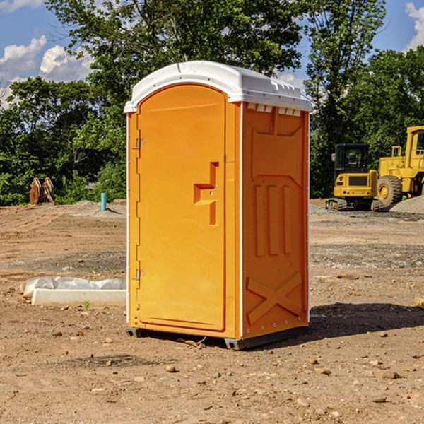 what is the cost difference between standard and deluxe portable toilet rentals in Caln